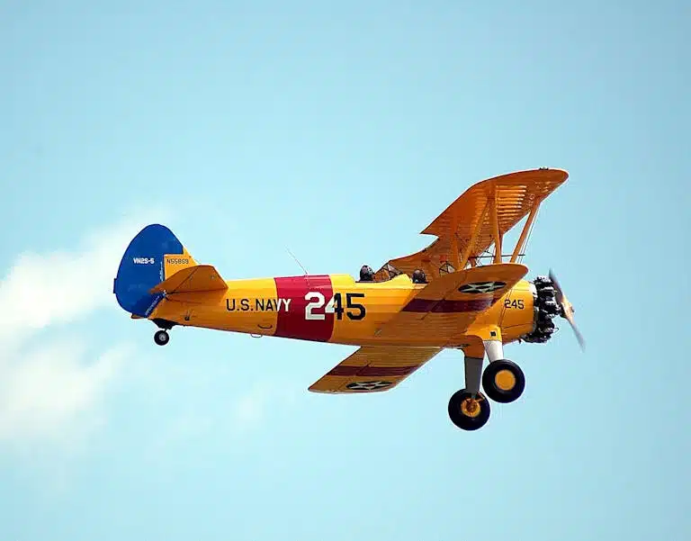 Paper plane flying on autopilot in sky - why smoking habit runs automatically Melbourne hypnosis